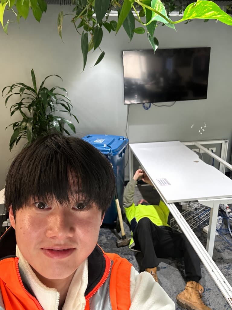 Sydney Office Clearance team dismantling commercial office workstations for structured handling